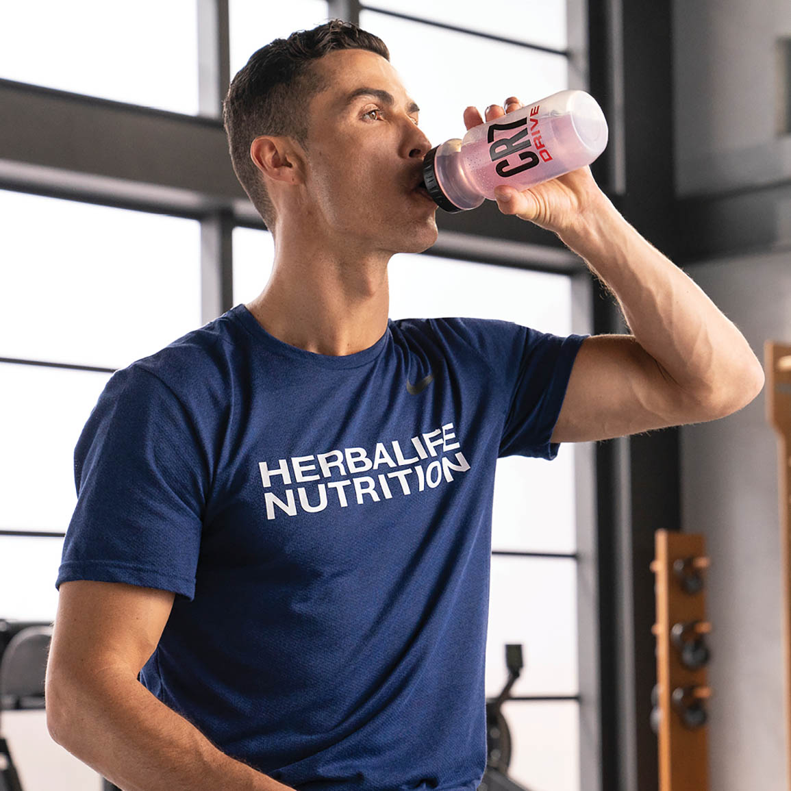 Cristiano Ronaldo Drinking Cr7 Drive With A Herbalife Nutrition T-Shirt On