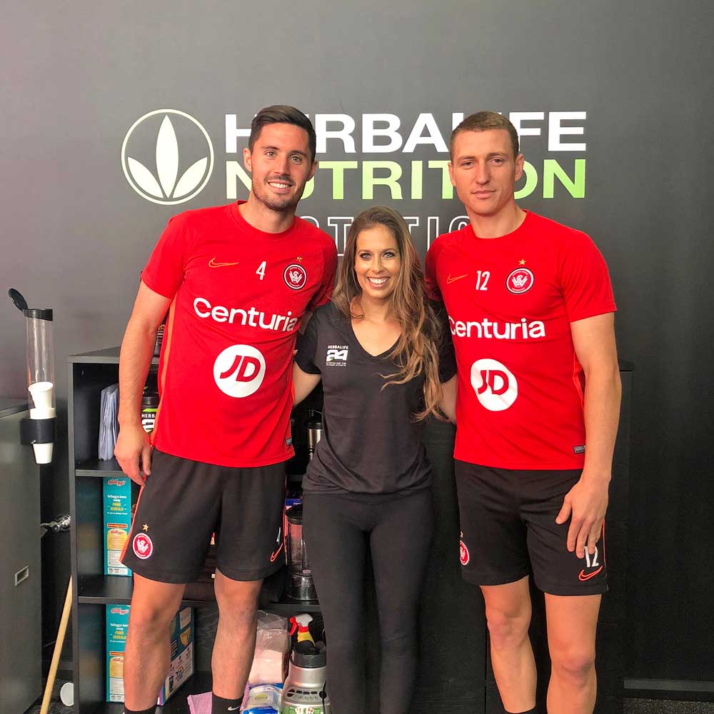 Dr Dana Ryan With Two Western Sydney Wanderers Players At The Herbalife Nutrition Station
