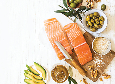 Food High In Healthy Fats, Fish, Olives And Avocado