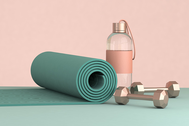 Composition shows yoga mat, water bottle and dumbbell