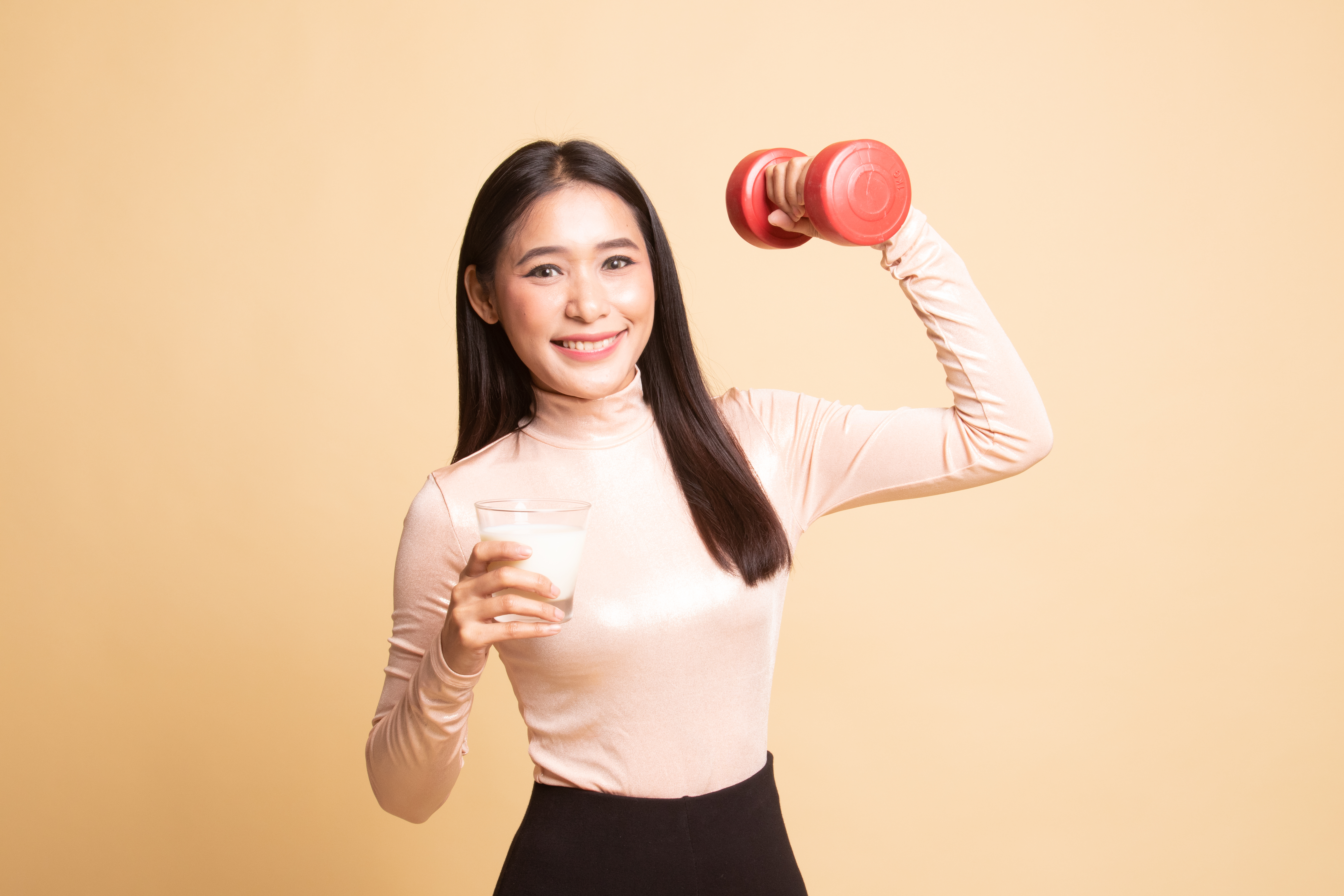 Woman Holding Red Dumbbell Ch