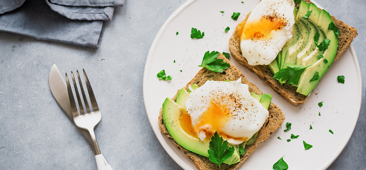 healthy breakfast with eggs and avocado