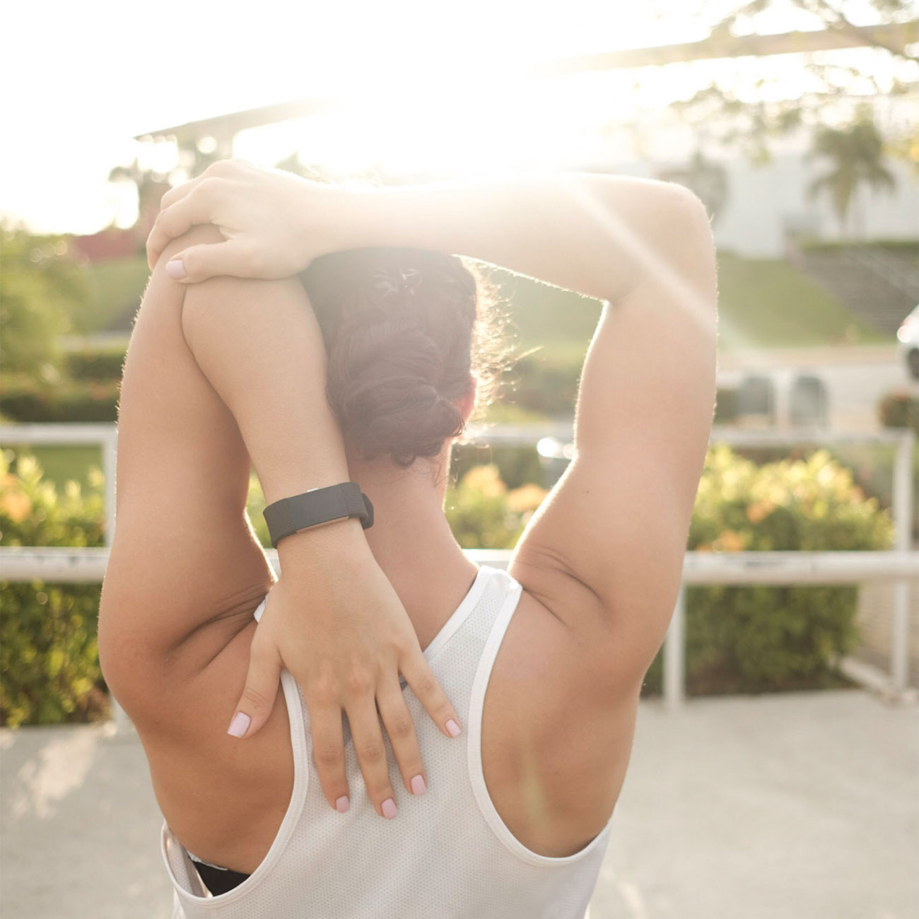 Woman stretching her arms after an outdoor workout