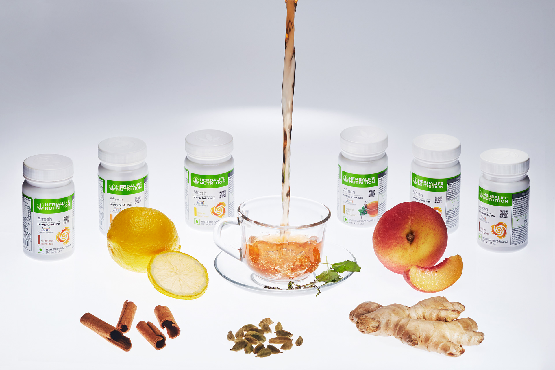 A product mastershot of Herbalife Nutrition Afresh with all flavours