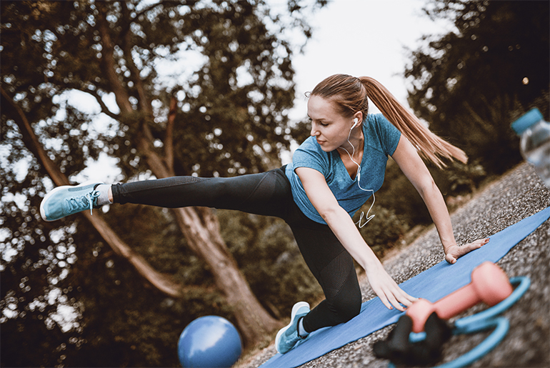Image of woman exercising outdoors