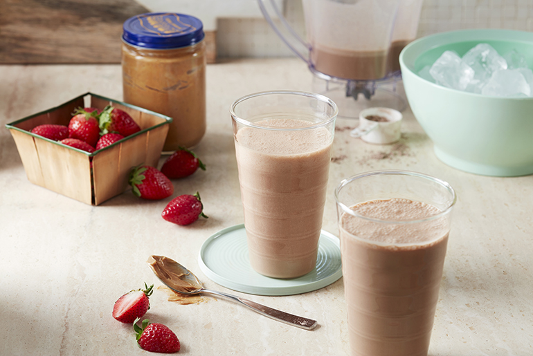 Image of a peanut butter cup shake with strawberry